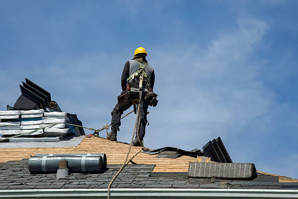 Professional Roof Replacement technician working in Beeson, WV